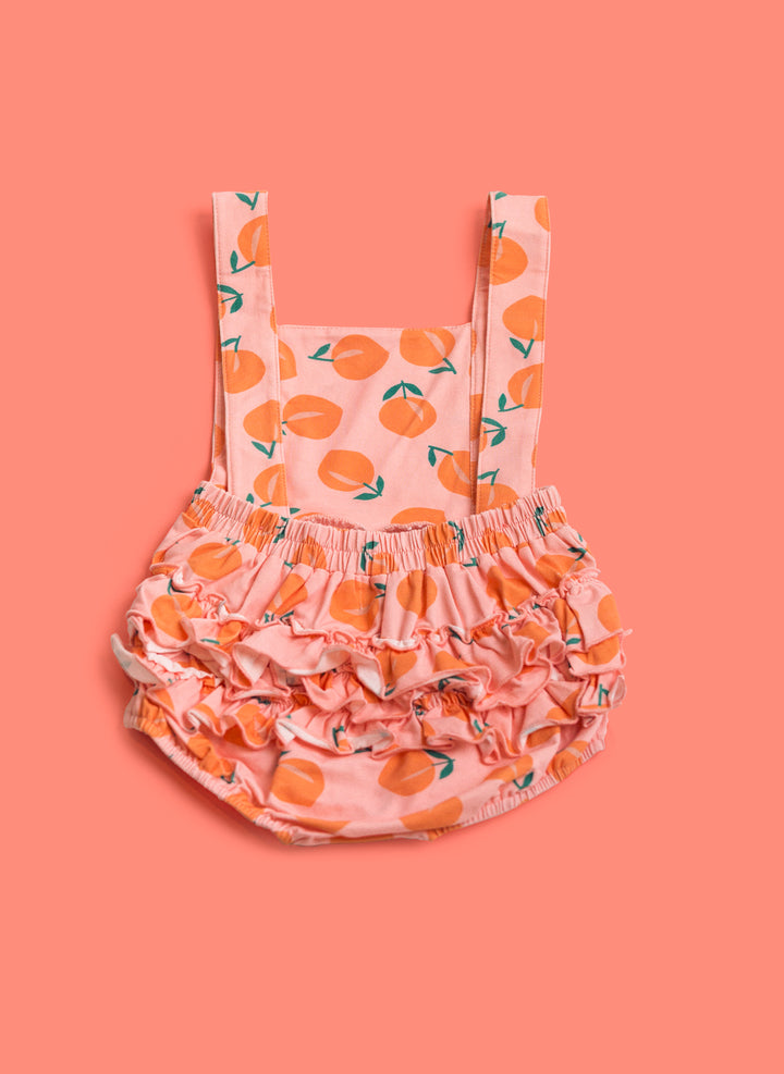 The Isla Romper In Just Peachy