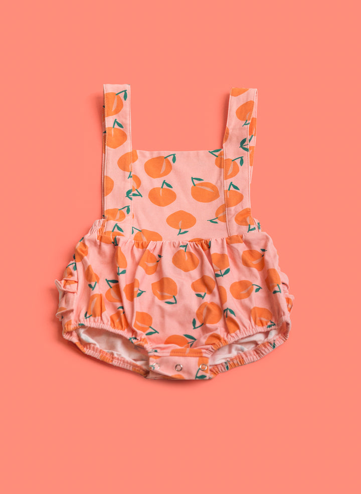 The Isla Romper In Just Peachy