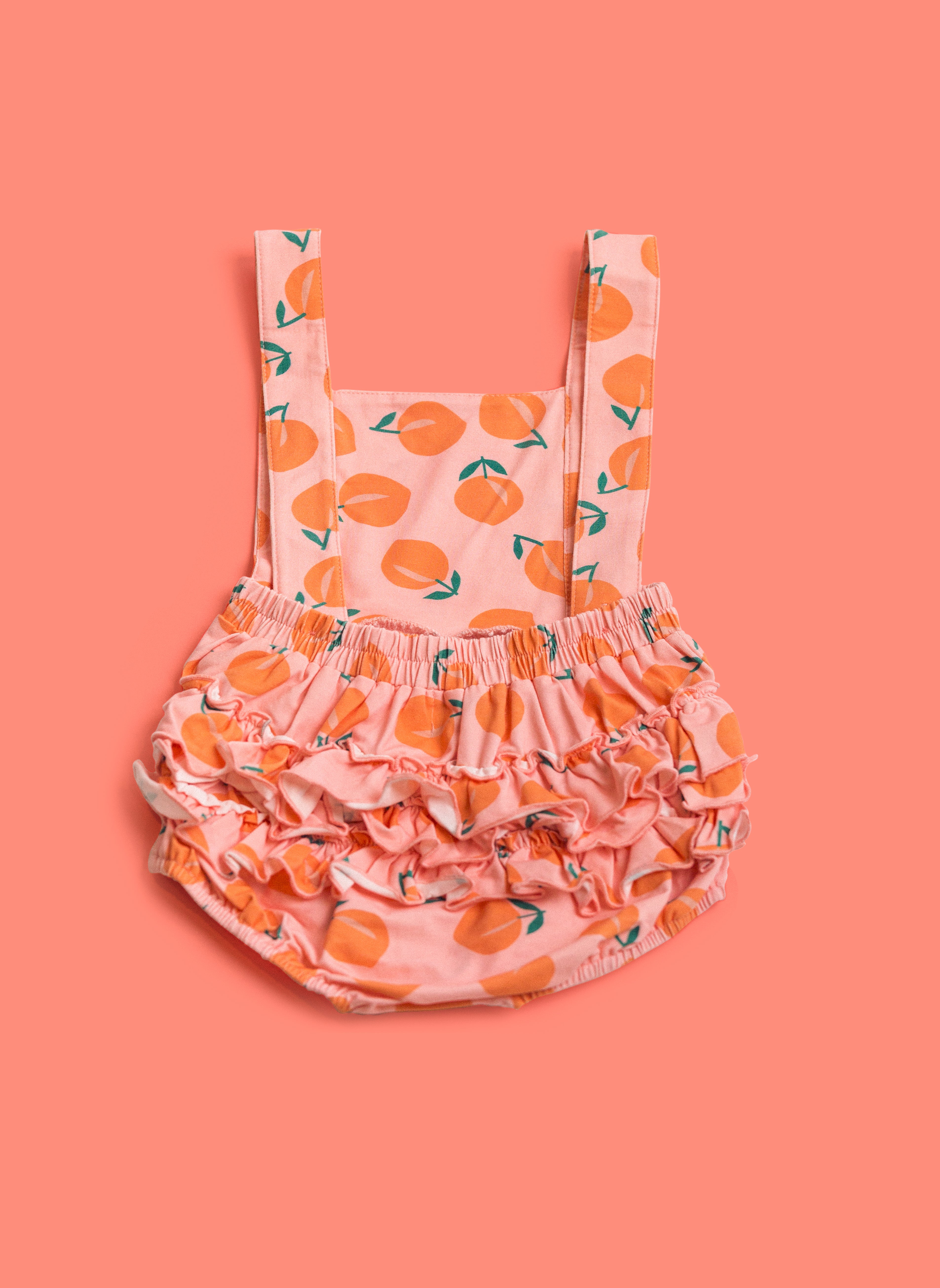 The Isla Romper In Just Peachy