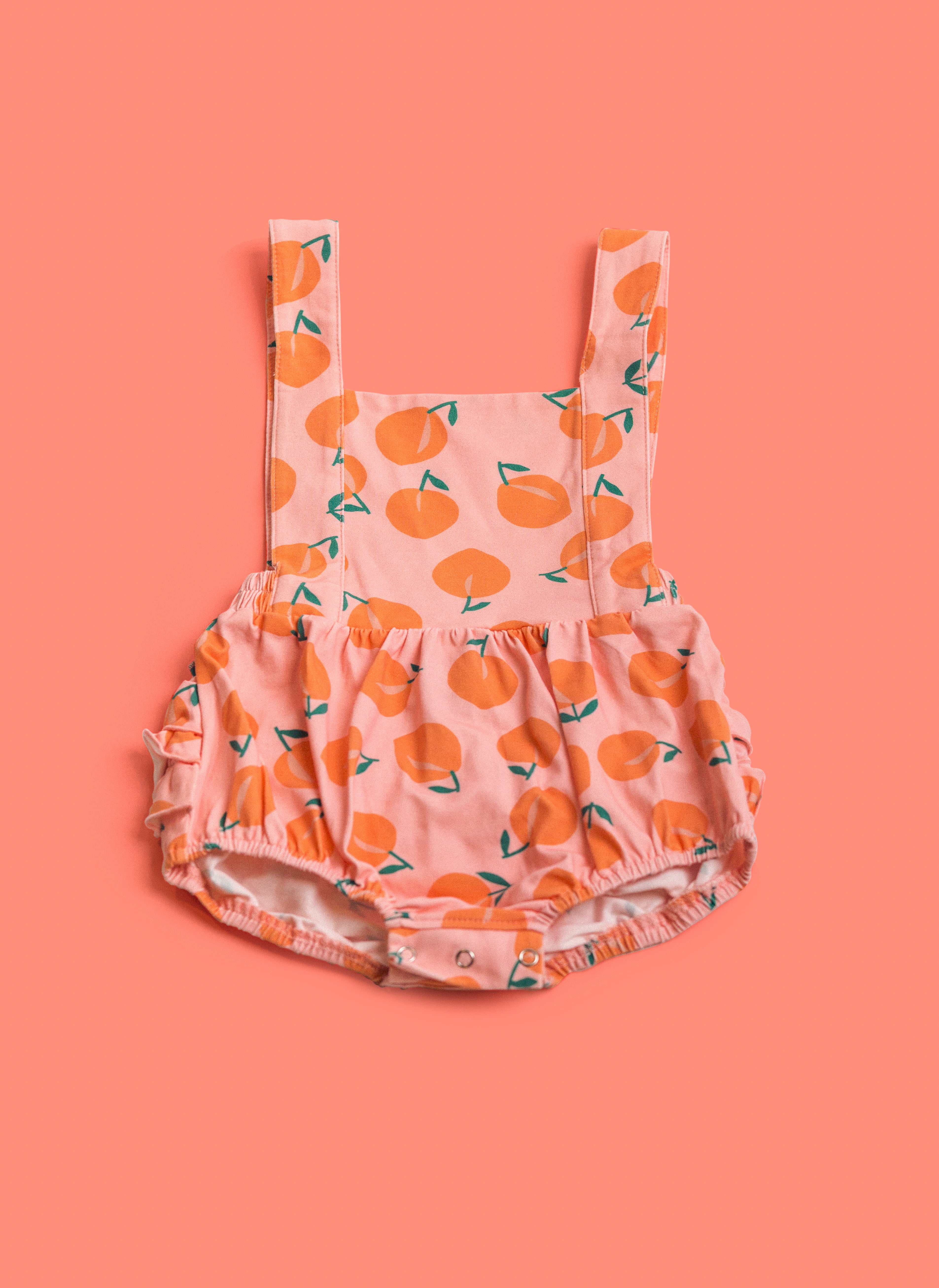 The Isla Romper In Just Peachy